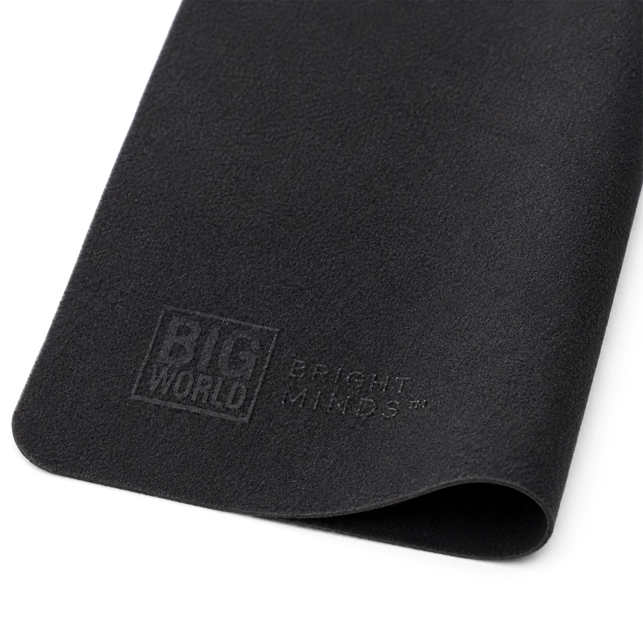 Close studio detail of black microfiber cloth and embossed logo