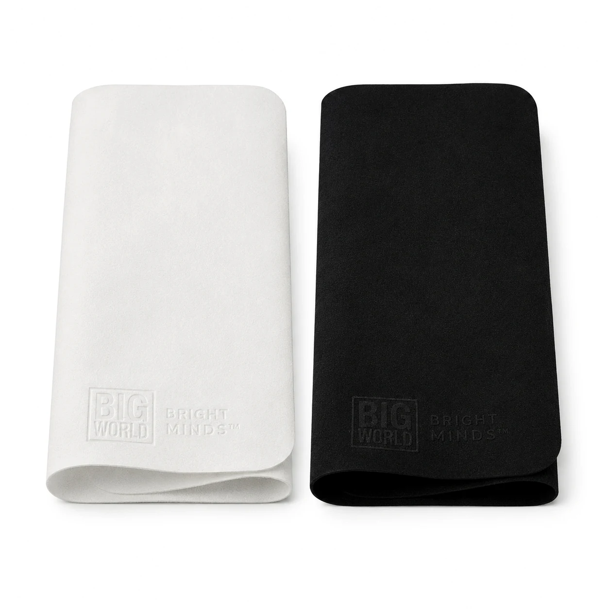 Black and white microfiber cloths in a clean studio setting